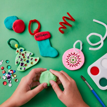 hands making clay ornaments