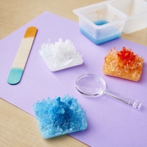 Man made crystals being created on a table. 