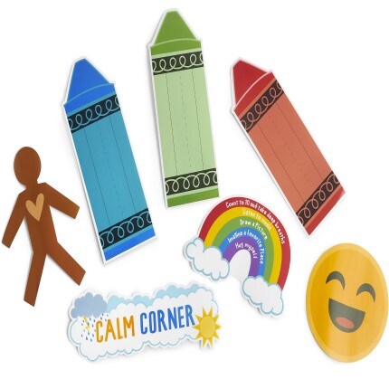 assorted classroom supplies on white background