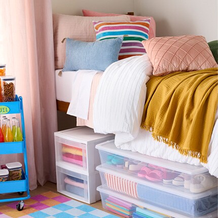 lofted dorm bed with plastic underbed drawer storage