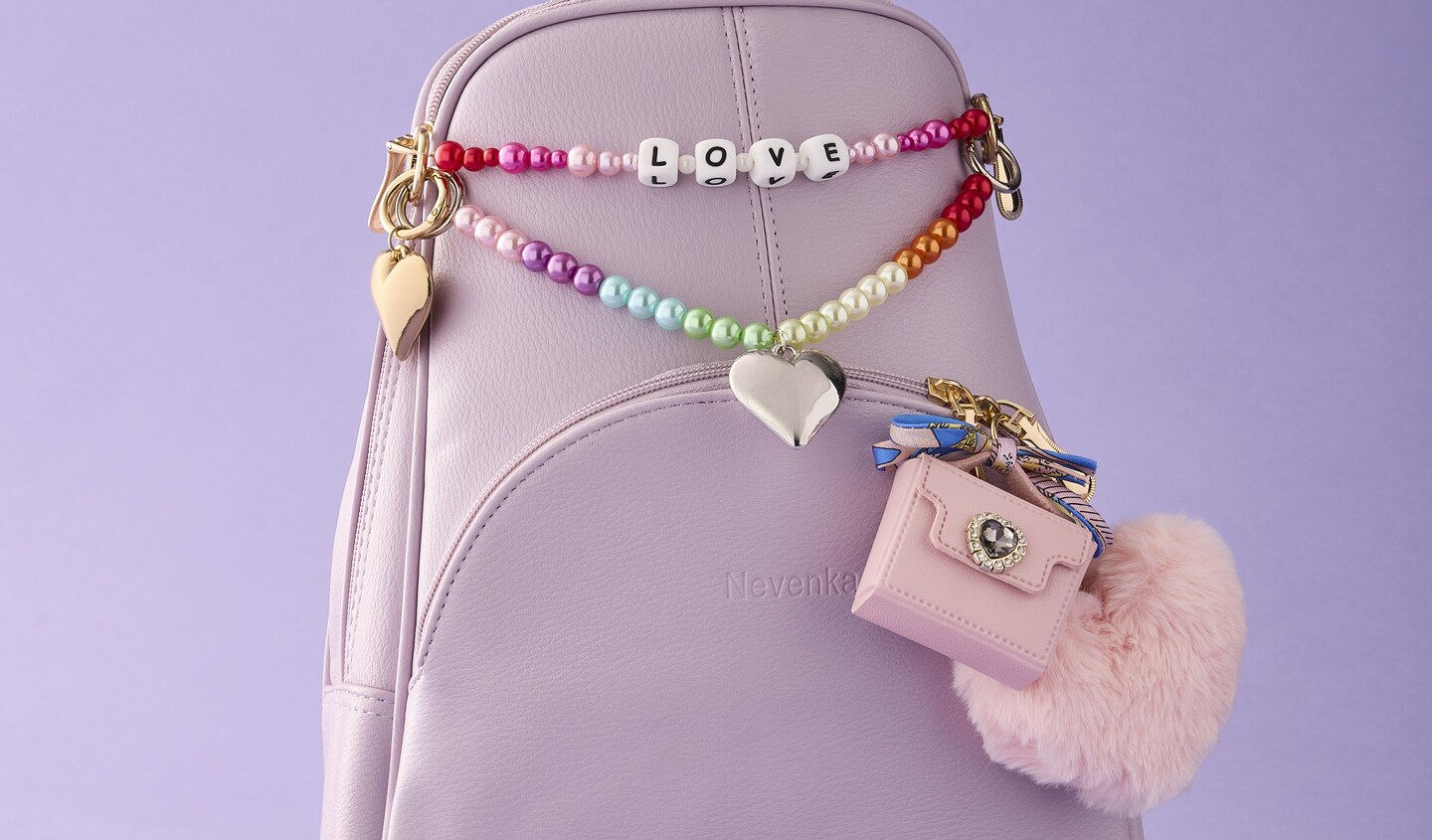 bag with charms & chains on it