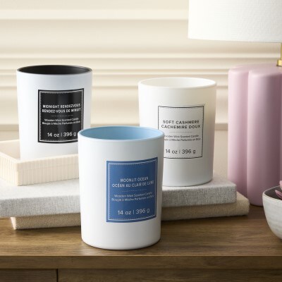 three assorted filled scented everyday candles 