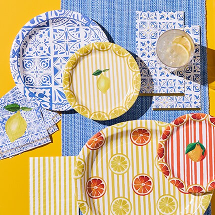 Spring party supplies with citrus theme in yellow and light blue