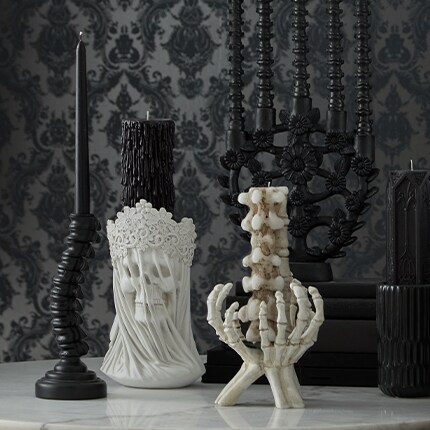 Halloween candles shaped as skeletons and skulls