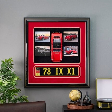 framed car model with license play and photos