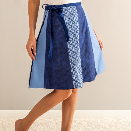 chair and ottoman in navy damask fabric