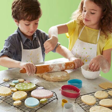 boy and girl baking cookies