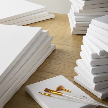 A stack of various level artist loft canvas