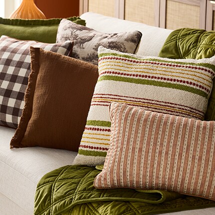 Fall inspired striped throw in orange, yellow, cream and blue colors