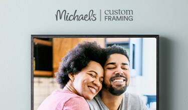 A wall tile of a couple embracing