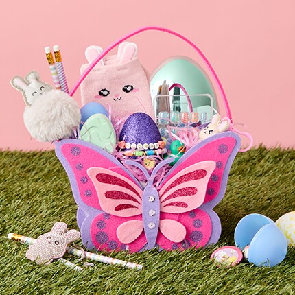 butterfly shaped Easter basket filled with toys and candy 