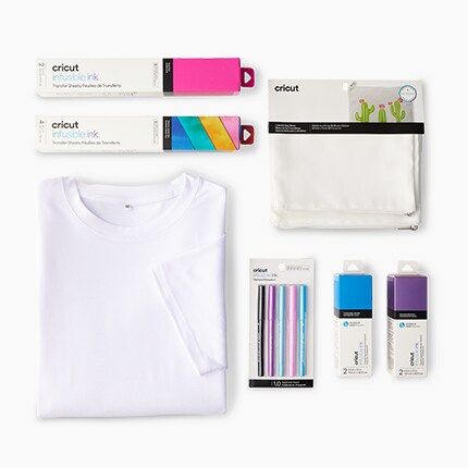 white t-shirt, vinyl rolls and weeding tools