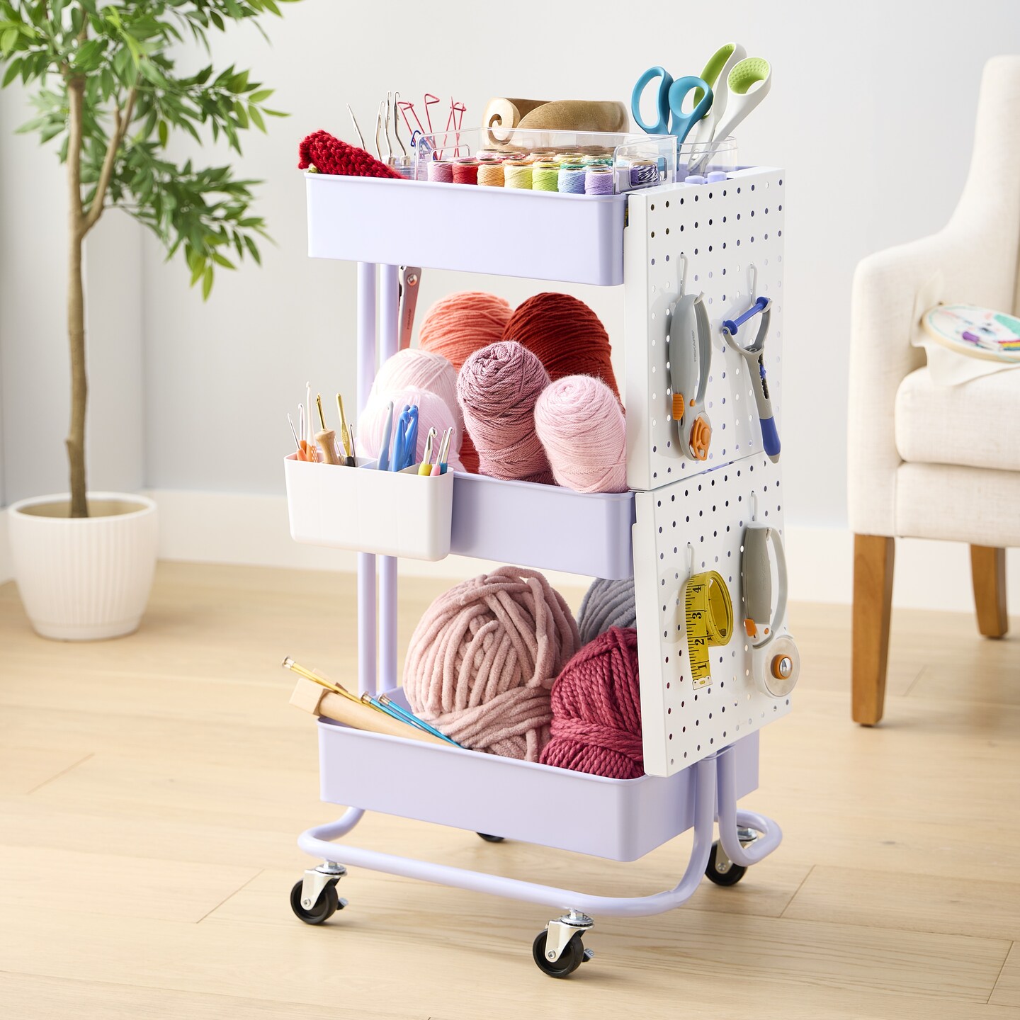 Lilac Lexington 3-Tier Rolling Cart by Simply Tidy® stocked with yarn crafting materials