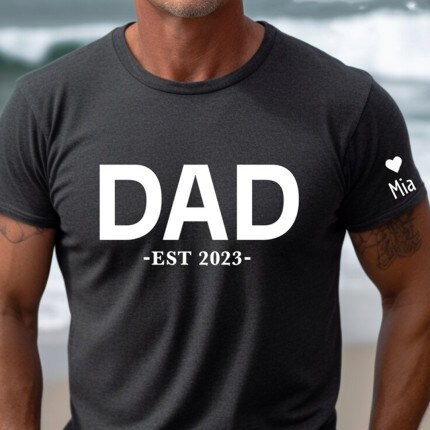 MakerPlace by Michaels: Grey T-shirt with word "DAD Est 2023".