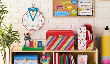 Classroom decorations against a wall. 