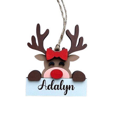 handmade personalized wooden ornament reindeer with a red bow with kids name