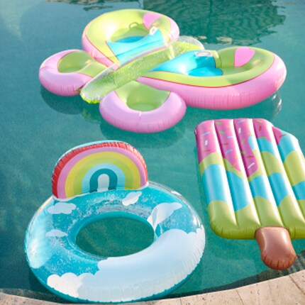 Kids outdoor toys and floats in a pool