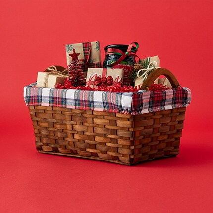 festive gifts inside a gift basket