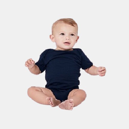 baby sitting in black onesie