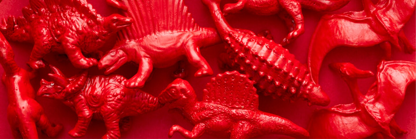 red dinosaur figurines