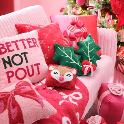 Christmas Pillows: pink and red pillows from the Berry Jolly Decor Collection