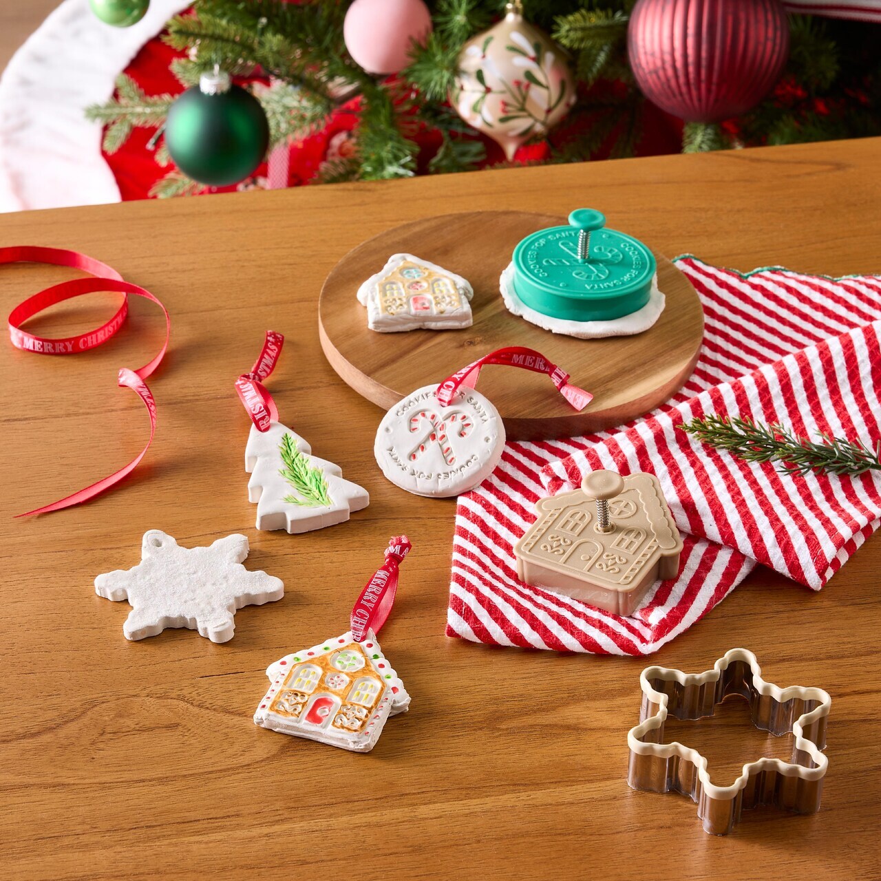 Craft custom clay ornaments using the cookie cutters provided at the event as well as other supplies like paint and foliage for texture