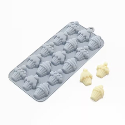 Gray silicone mold tray with assorted muffin shapes