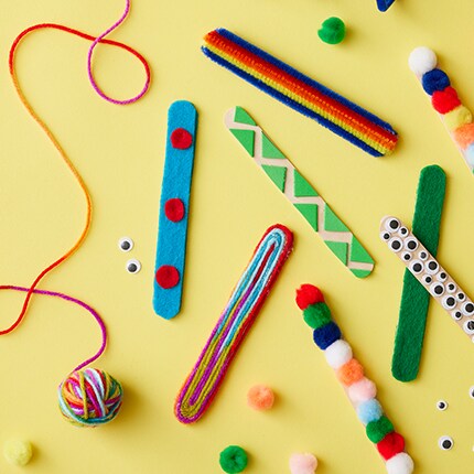 Craft sticks with yarn