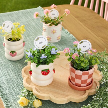 spring vases on a table outside