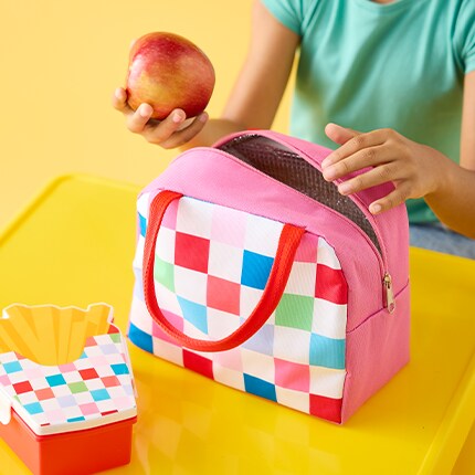 Bento box against a pink wall