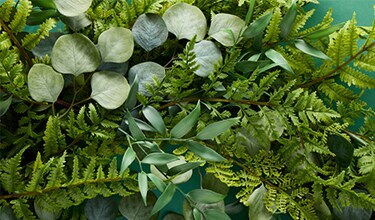 assorted faux greenery