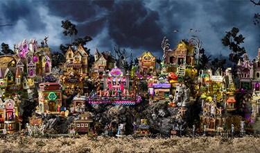 lemax spooky town village scene with 2026 buildings