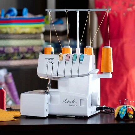 serger sewing machine with orange thread