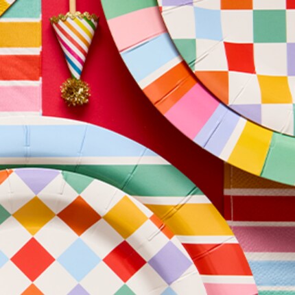 lower prices on party supplies. stripes and multi-color paper party plates 