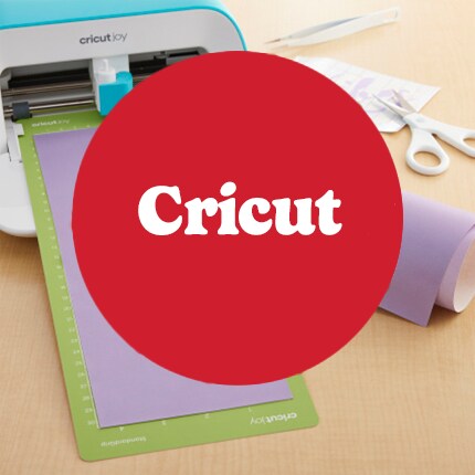 Cricut in white text in red bubble over cutting machine