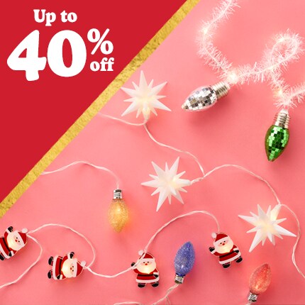 string lights with pink background and up to 40% off in white text over red triangle
