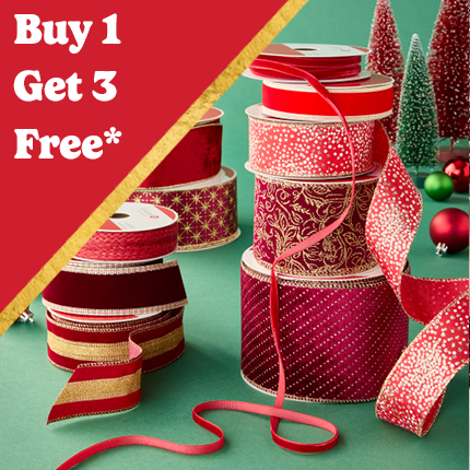 stacked spools of red decorative ribbon with Buy 1 Get 3 Free in white text over red triangle