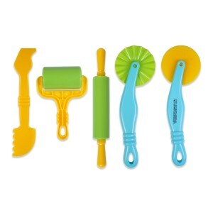 Various plastic tools lined up over a white background