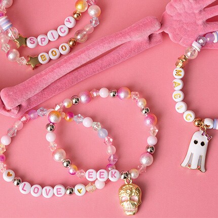 pink bead bracelets with alpha beads and ghost charms