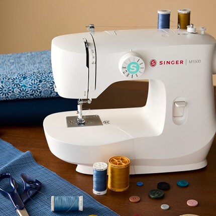 white Singer sewing machine