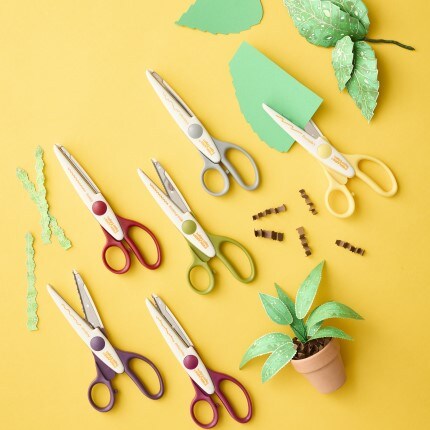 Fiskars scissors on yellow background
