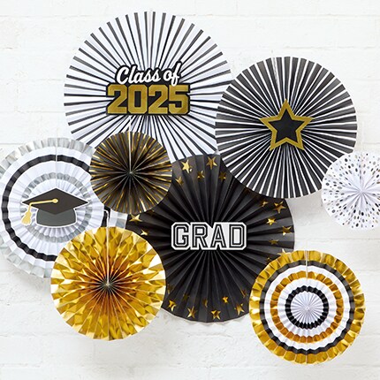 black, white and gold pinwheel graduation party decorations
