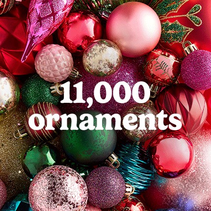 A vibrant collection of Christmas ornaments in red, pink, green, and gold with glitter and patterns. Text overlay reads "11,000 ornaments." Festive and colorful.