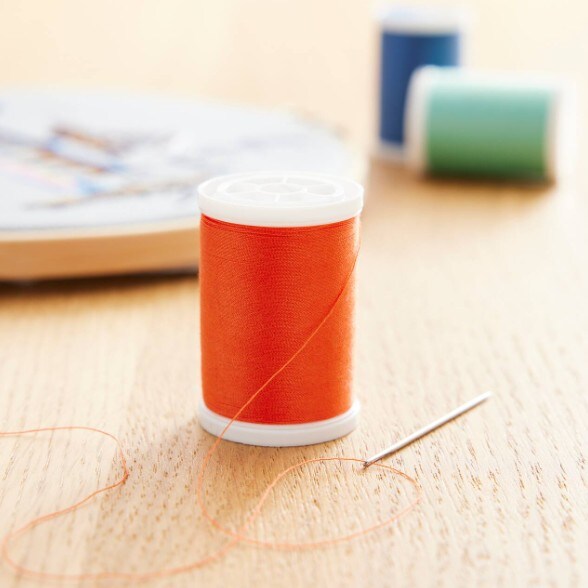 orange thread spool