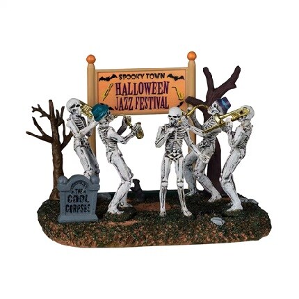 figurines of skeletons dancing and playing music