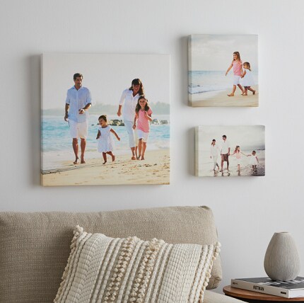three photo printed canvases with family beach photos