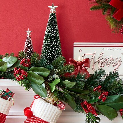 Peppermint lane decor with Red and white ornament wreath, Santa and table top trees