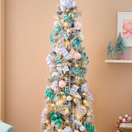 pencil tree with silver and green ribbon and tinsel