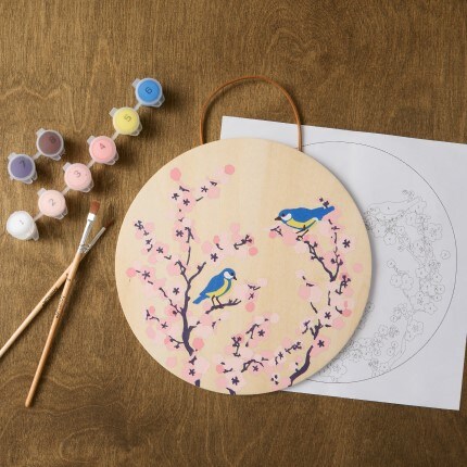 painting of cherry blossoms and birds on wood surface
