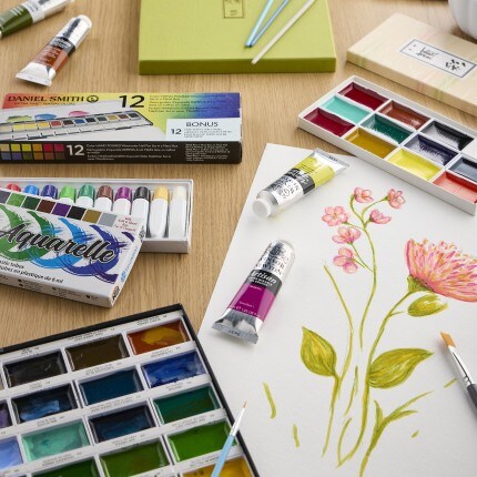 Fine Art Paint Sets, Tubes, & Brushes on white table